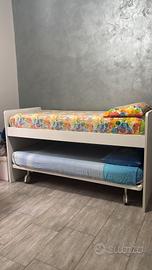 Letto singolo con secondo letto estraibile.