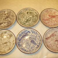 piatti con disegni di uccelli