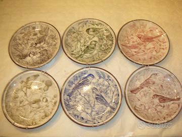 piatti con disegni di uccelli