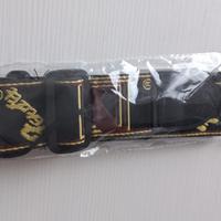 tracolla chitarra nuova con scritta Fender 