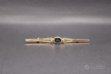 SPILLA IN ORO CON  ZAFFIRO E BRILLANTI