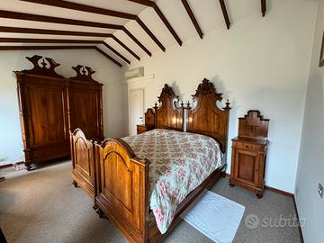 Camera da letto classica ‘800