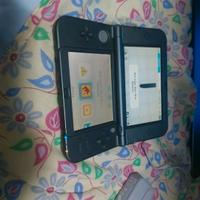 New Nintendo 3DS XL + New Super Mario Bros + 2 car