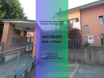 AICURZIO-Su due livelli