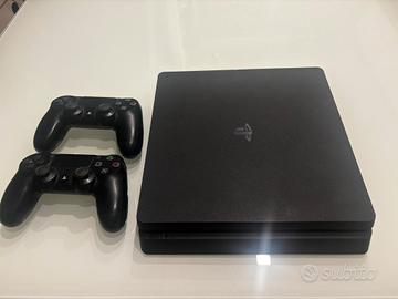 PlayStation 4 slim 1 Tera + 2 joystick e giochi
