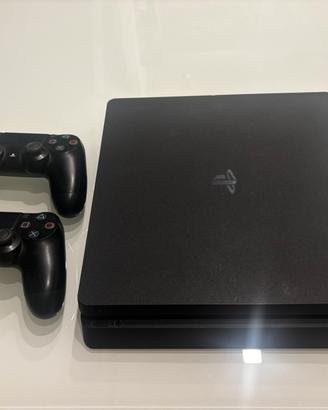 PlayStation 4 slim 1 Tera + 2 joystick e giochi