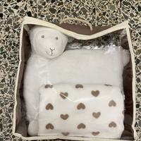 Cuscino e plaid pois bianco