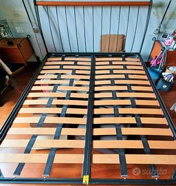 Letto matrimoniale (già smontato) in legno massell