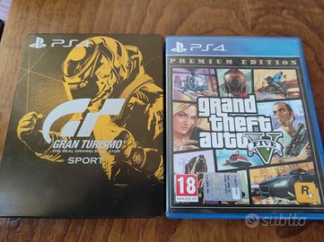 PS4 con giochi e scatola