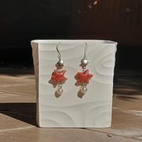 Orecchini con stella marina in ceramica