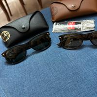 Due paia di occhiali rayban wayfarer