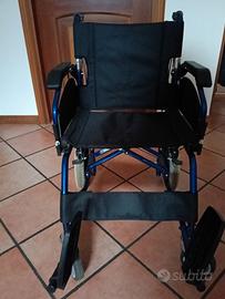carrozzina per anziani/disabili motori