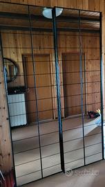 Armadio a specchio ante scorrevoli, interno nero