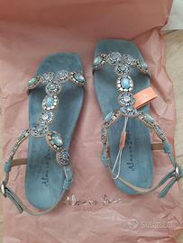 ALMA EN PENA Sandali