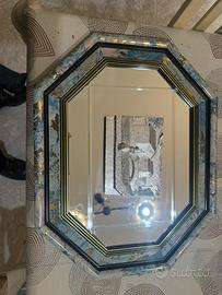 Specchio con bassorilievo argento