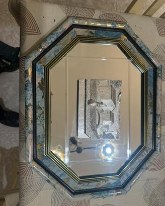 Specchio con bassorilievo argento