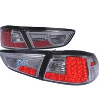 FANALI MITSUBISHI LANCER SEDAN 08- LED FONDO CROMA