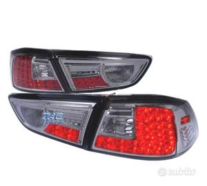 FANALI MITSUBISHI LANCER SEDAN 08- LED FONDO CROMA