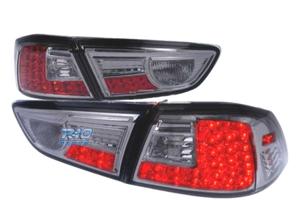 FANALI MITSUBISHI LANCER SEDAN 08- LED FONDO CROMA