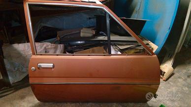 Portiera sx ford fiesta 1a serie modello 1.1 ghia