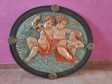 Capezzale ovale antico e rete matrimoniale a doghe