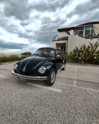 Volkswagen new Beatle maggiolino restauro completo