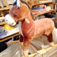 Cavallino a dondolo in legno con effetti sonori