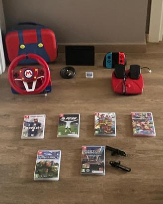 Nintendo switch 6 giochi e simulatore guida