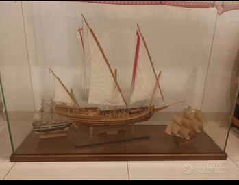 bacheca con tre barche