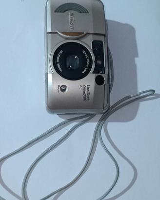 Nikon Lite-Touch Zoom 70W. 
