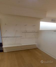 A49 Arredo negozio Pannelli Garau in legno MDF