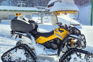 Quad Can-am con cingoli