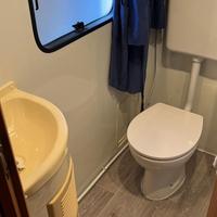 Bungalow con roulotte