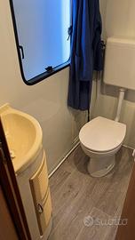 Bungalow con roulotte