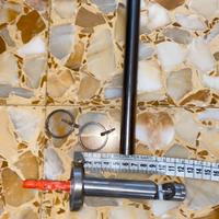 Riloga per tende in metallo