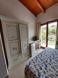 Casa con terrazza coperta