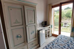 Casa con terrazza coperta