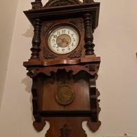 Orologio a pendolo artigianale antico