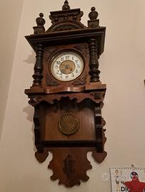 Orologio a pendolo artigianale antico