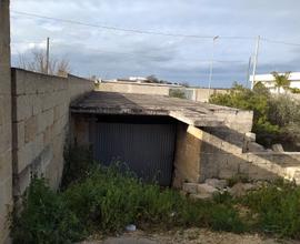 Garage allo stato grezzo condonato