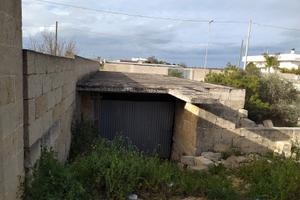 Garage allo stato grezzo condonato