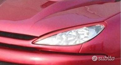 Palpebre fanali anteriori PEUGEOT 206