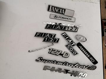 Fregi e loghi auto classiche e d'epoca