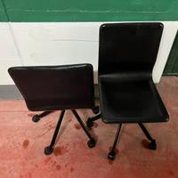 Due Poltroncine rivestite pelle nera con Ruote