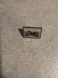 Barbour spilla 