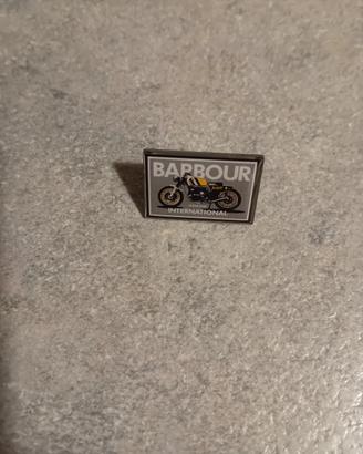 Barbour spilla 