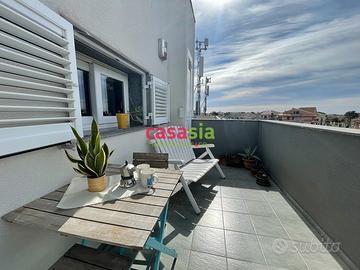 Mansarda con terrazzino e garage Viale delle Ameri