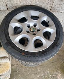 alfa romeo 4 cerchi da 16 completi , gomme al 60%