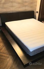 Letto giapponese con cassettone testata in pelle