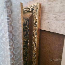 SPECCHI CON CORNICE DORATA STILE BAROCCO.